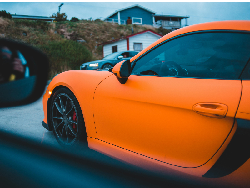 orange car with window tint